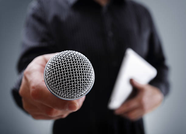 interview-with-microphone-picture-id511014724